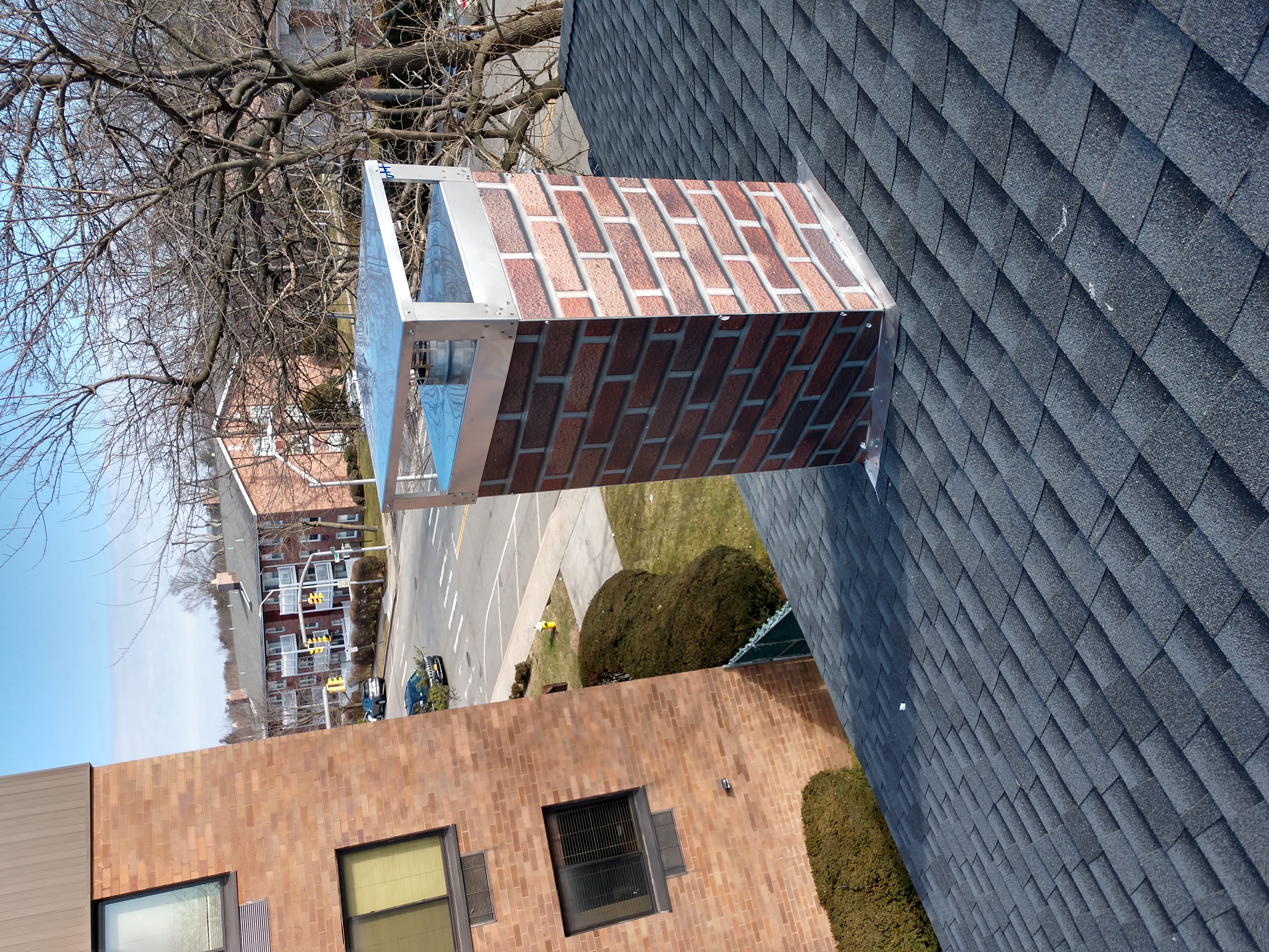 New elastomeric sealant applied to chimney crown in West Hampton, NY